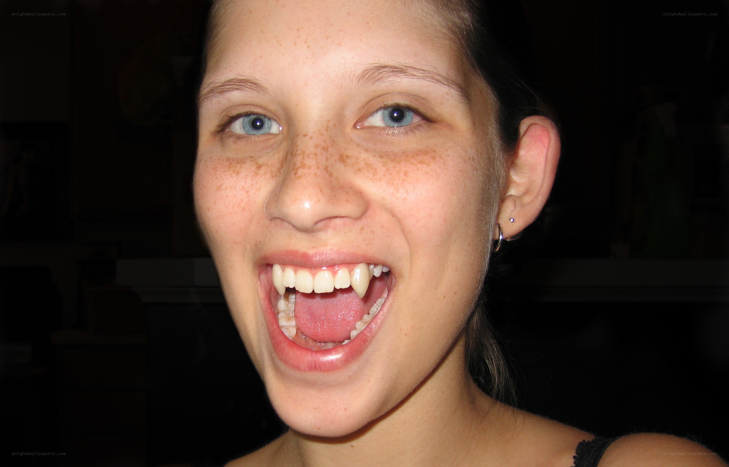 woman with vampire teeth