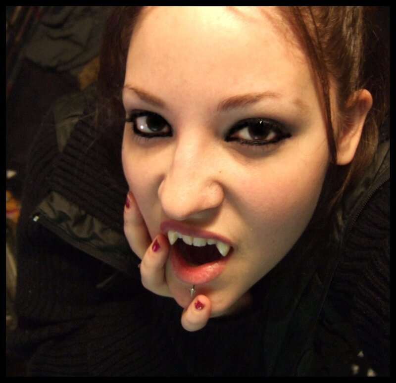 Woman with Vampire Teeth — Black, Dramatic, Photograph