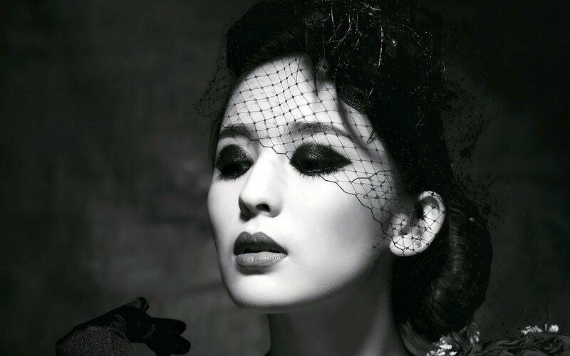 Woman with Veil and Dark Makeup