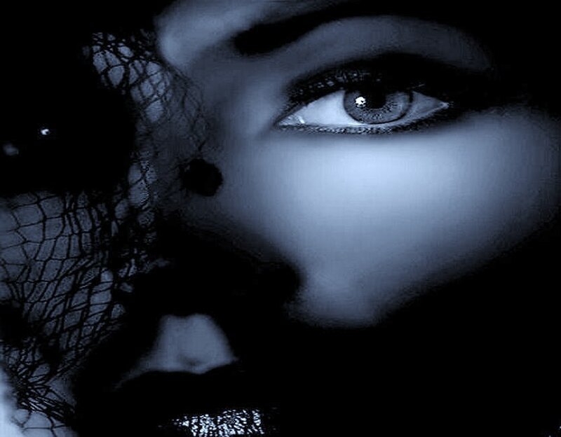 woman with veil and dramatic lighting