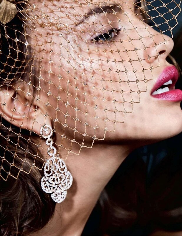 woman with veil and earrings