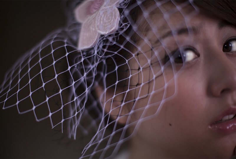 woman with veil and flower