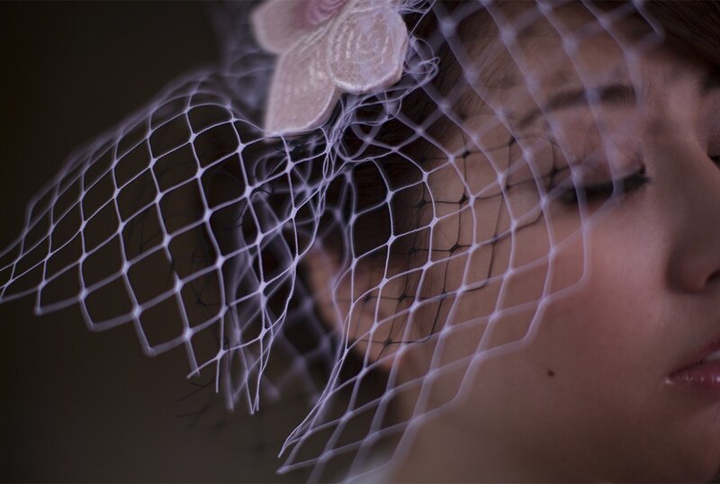 woman with veil and flower