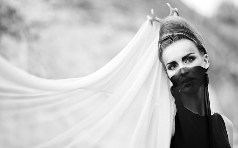woman with veil and mask