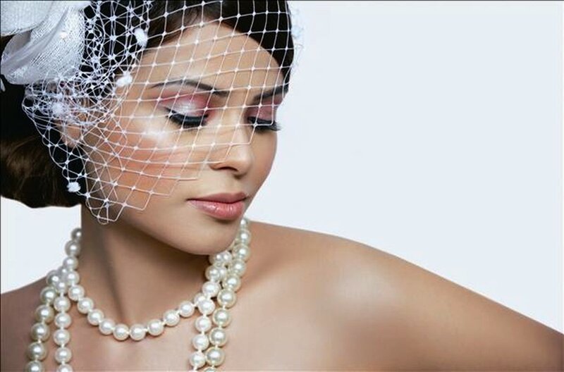 Woman with Veil and Pearls