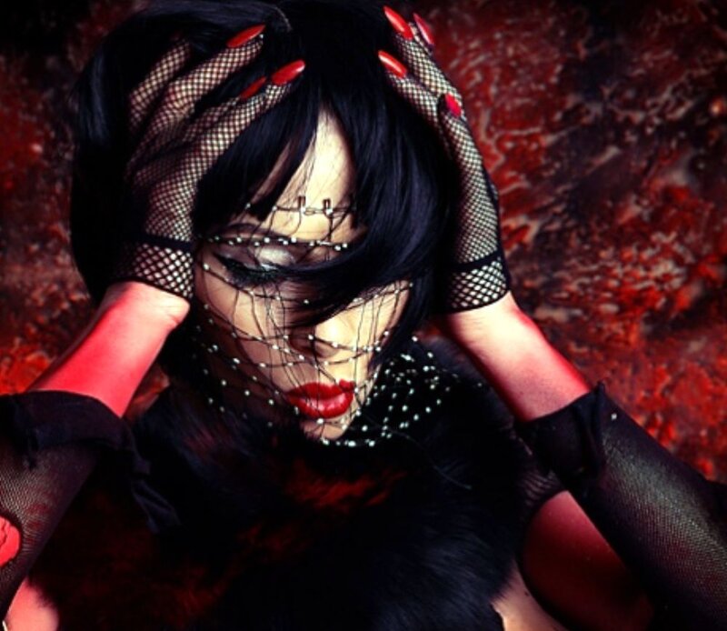woman with veil and red lips