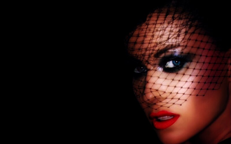 woman with veil and red lips