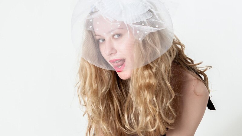 woman with veil and red lipstick