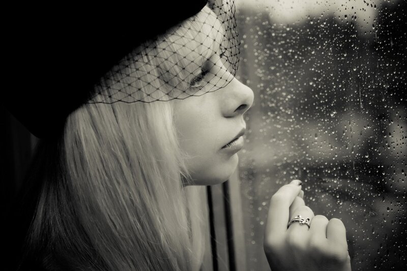 Woman with Veil at Window