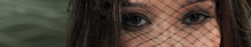 woman with veil covering face
