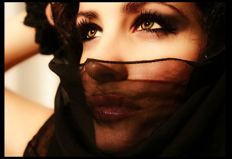 woman with veil covering face