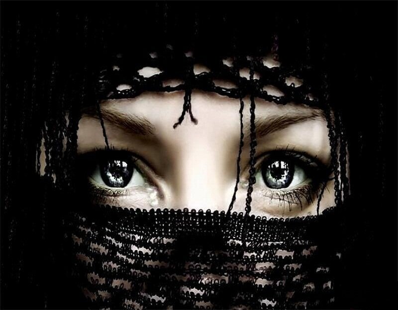 woman with veil covering face
