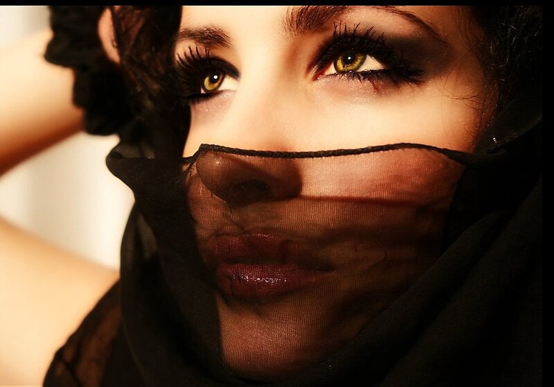 woman with veil covering face