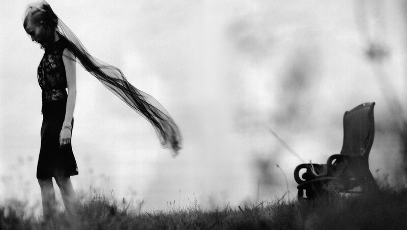 Woman with Veil in Field — Black