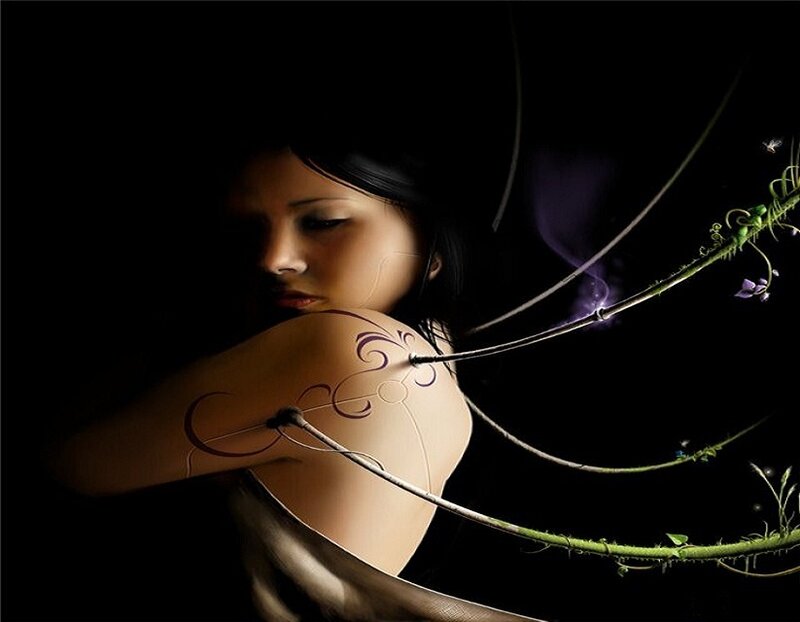woman with vine tattoo