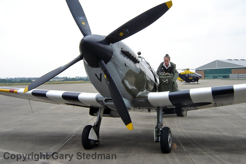 woman with vintage airplane