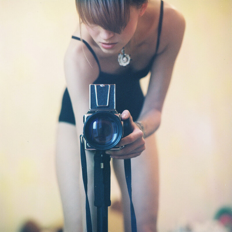 woman with vintage camera