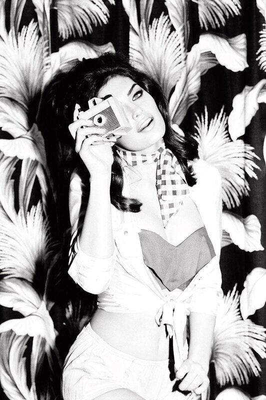 Woman with vintage camera