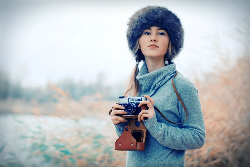 woman with vintage camera
