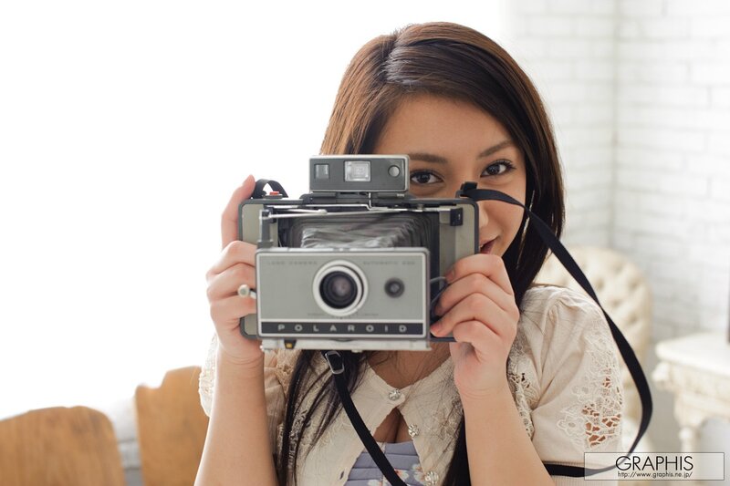 Woman with vintage camera