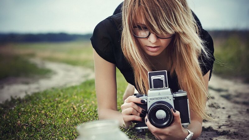woman with vintage camera