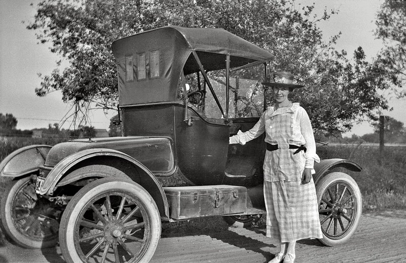 Woman with vintage car
