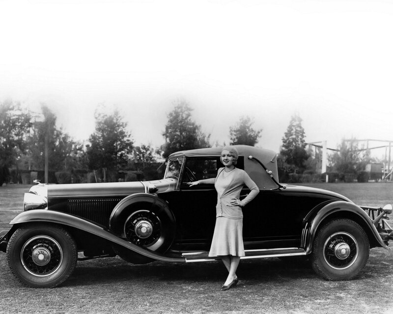 Woman with vintage car