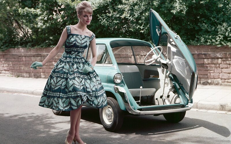 Woman with vintage car