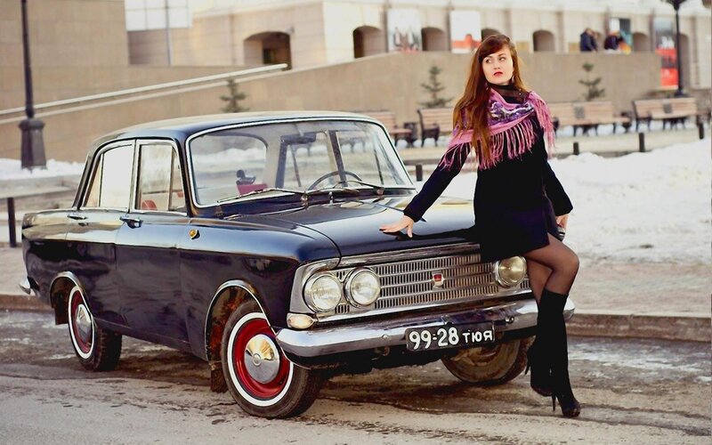 Woman with vintage car