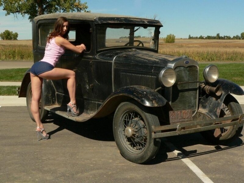 Woman with vintage car