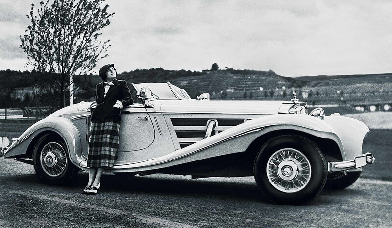 Woman with vintage car