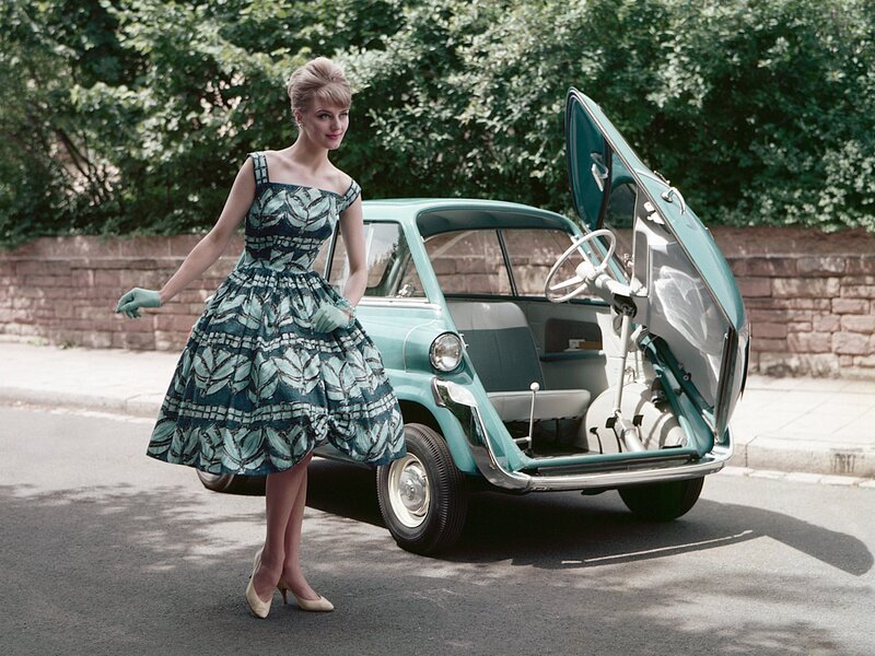 Woman with vintage car