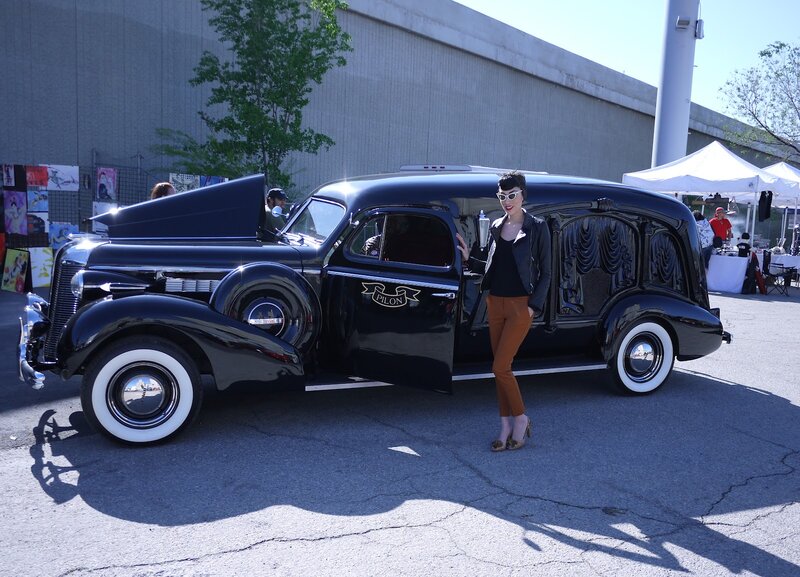 Woman with Vintage Hearse