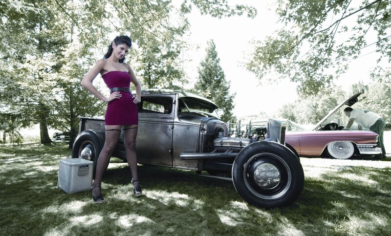 Woman with vintage hot rod