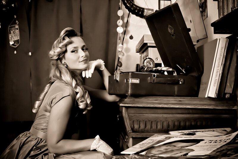 woman with vintage record player