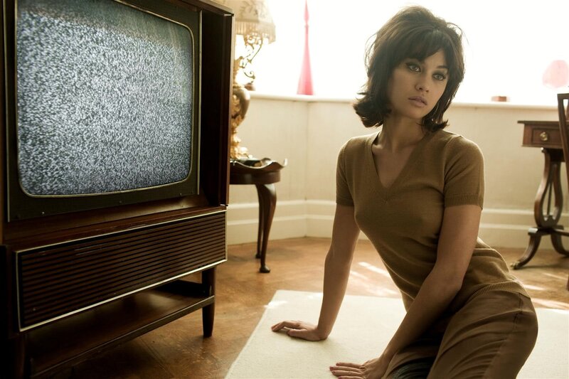 Woman with vintage TV