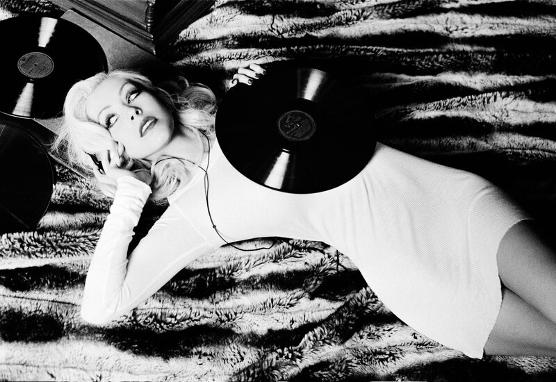 woman with vinyl records