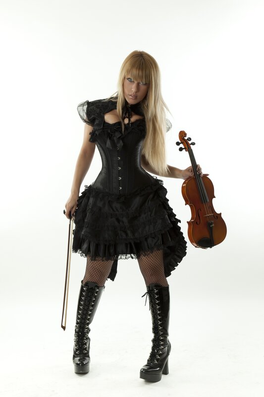 woman with violin in gothic dress