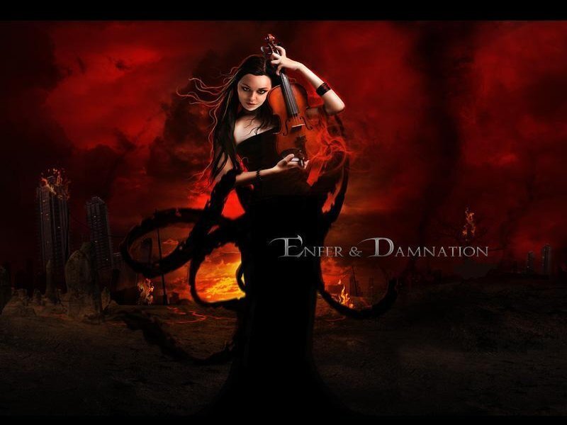 Woman with violin in hellish landscape