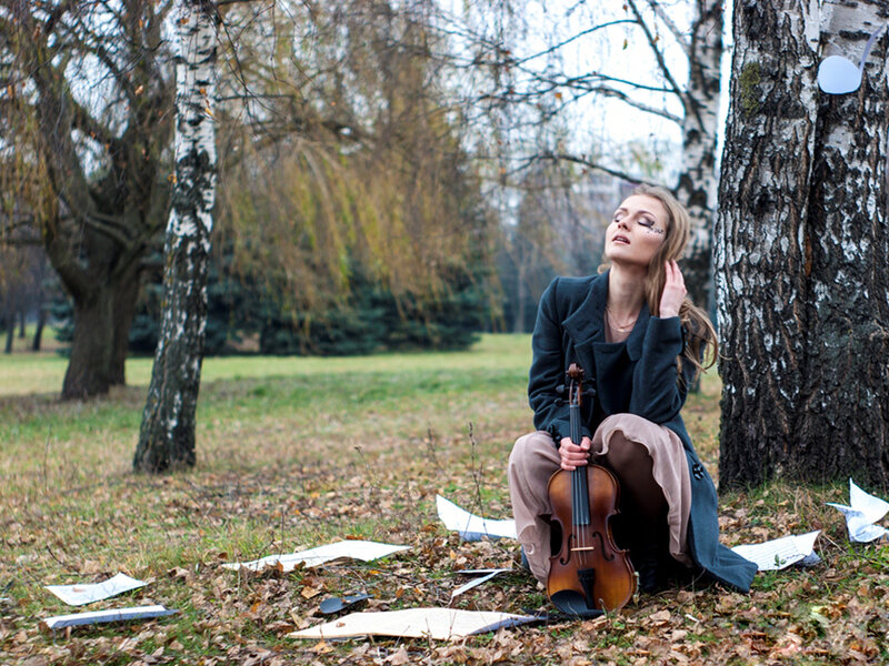 Woman with Violin in Park