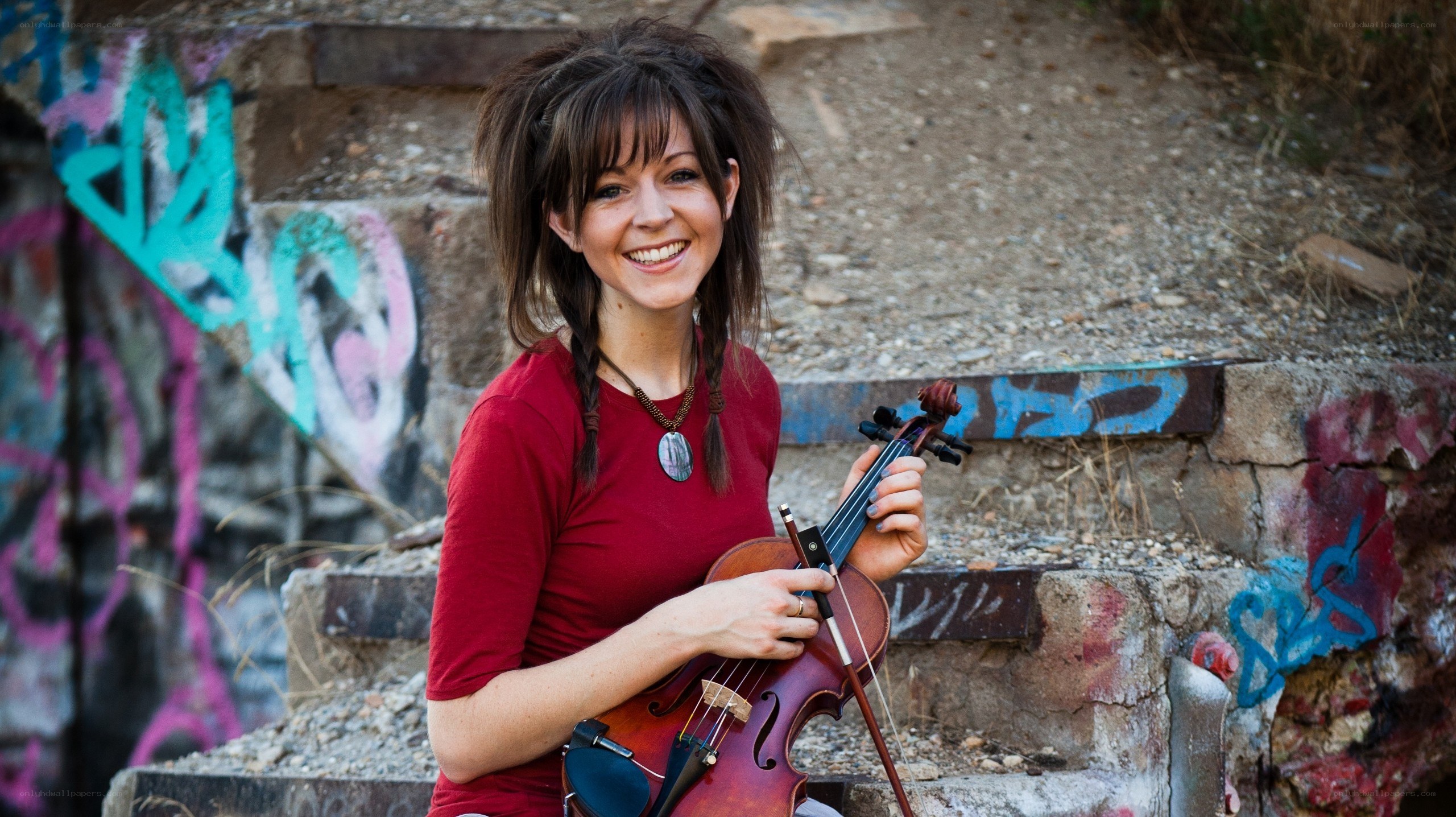 Woman with violin on steps