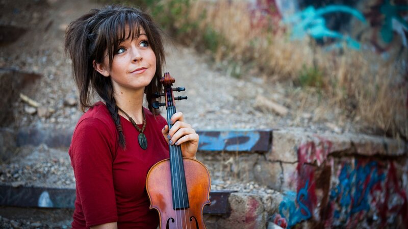 woman with violin outdoors