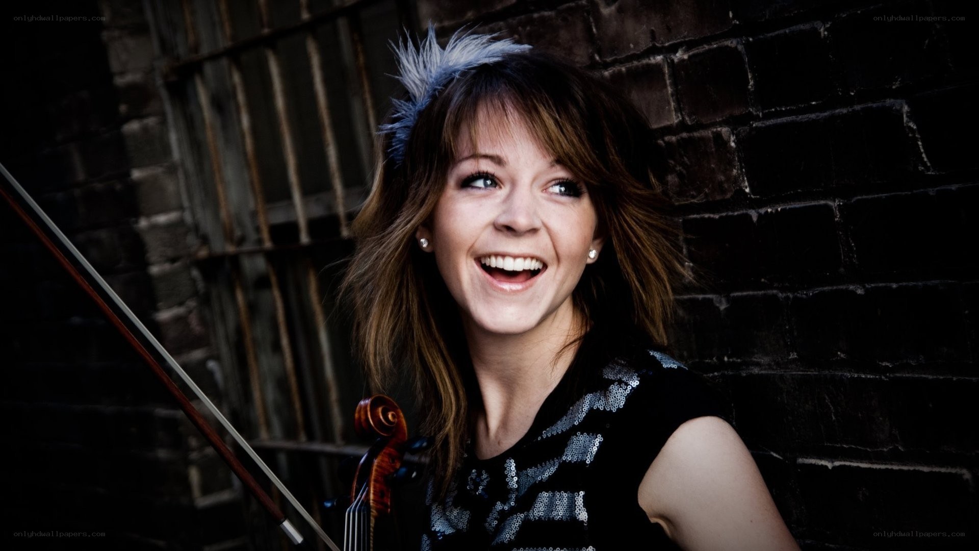 woman with violin smiling