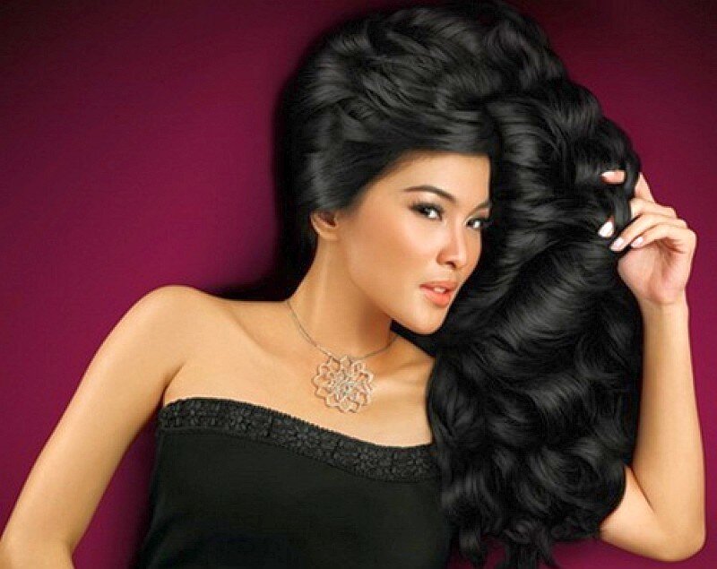 woman with voluminous black hair