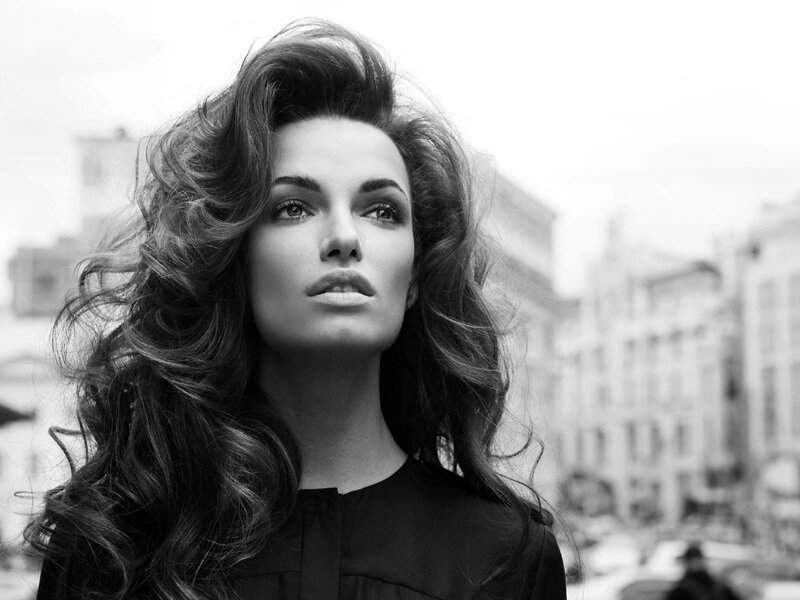Woman with Voluminous Hair — Black, Dramatic