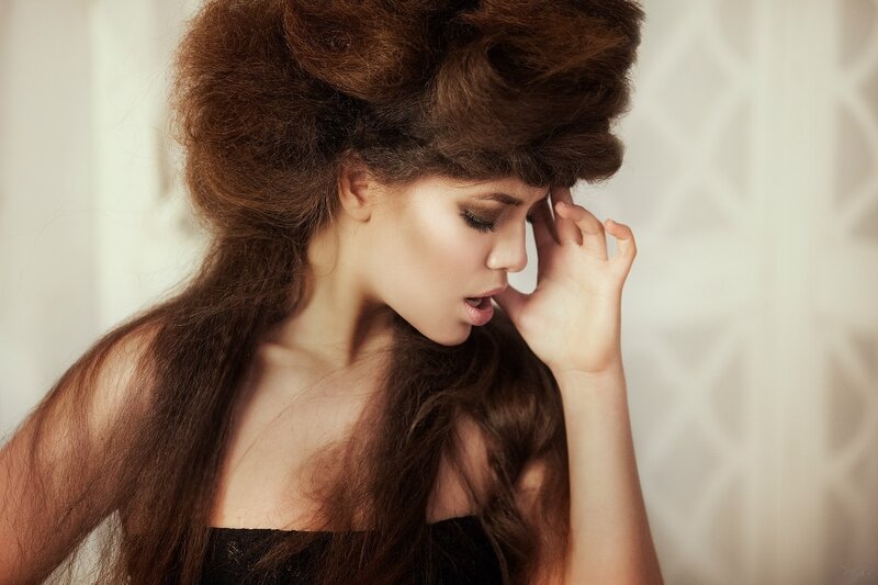 Woman with Voluminous Hair — Brown, Dramatic, Photograph, Hand