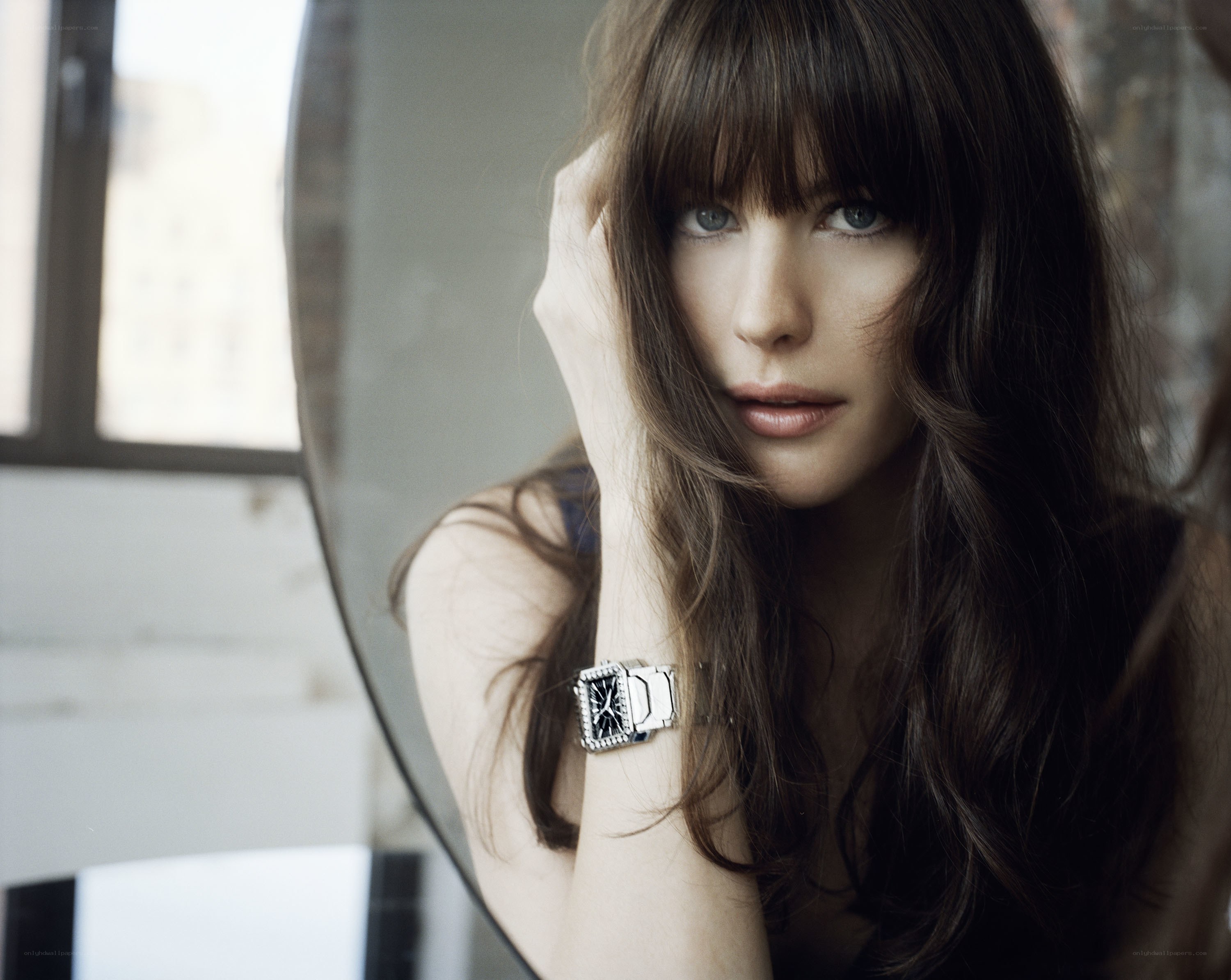woman with watch in studio