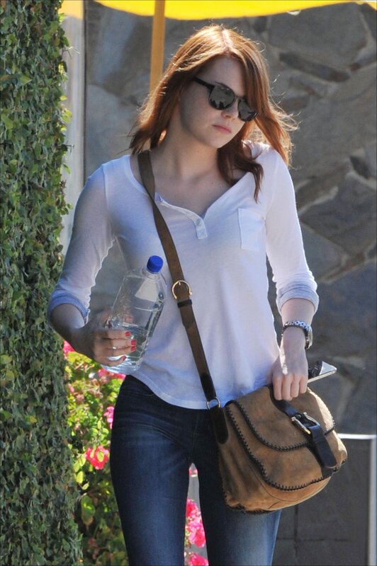 Woman with water bottle and bag