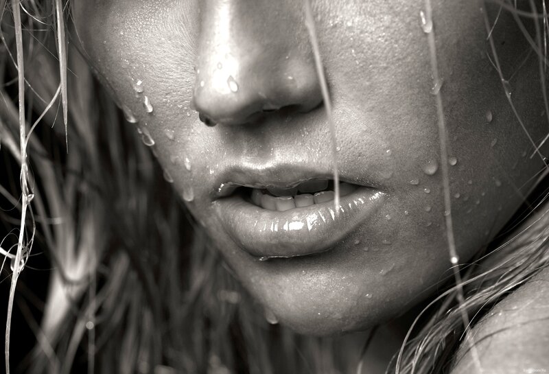 woman with water droplets on face
