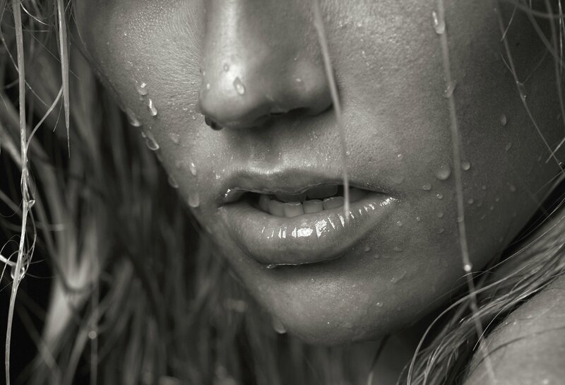woman with water droplets on face